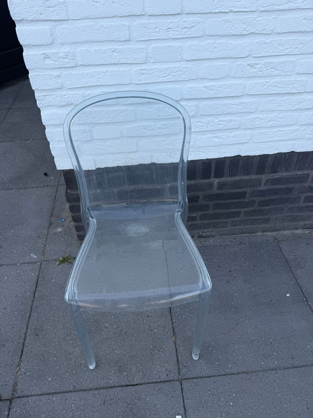 4 stuks kunsttof doorzichtige eettafelstoelen., Tuin en Terras, Ophalen, Gebruikt