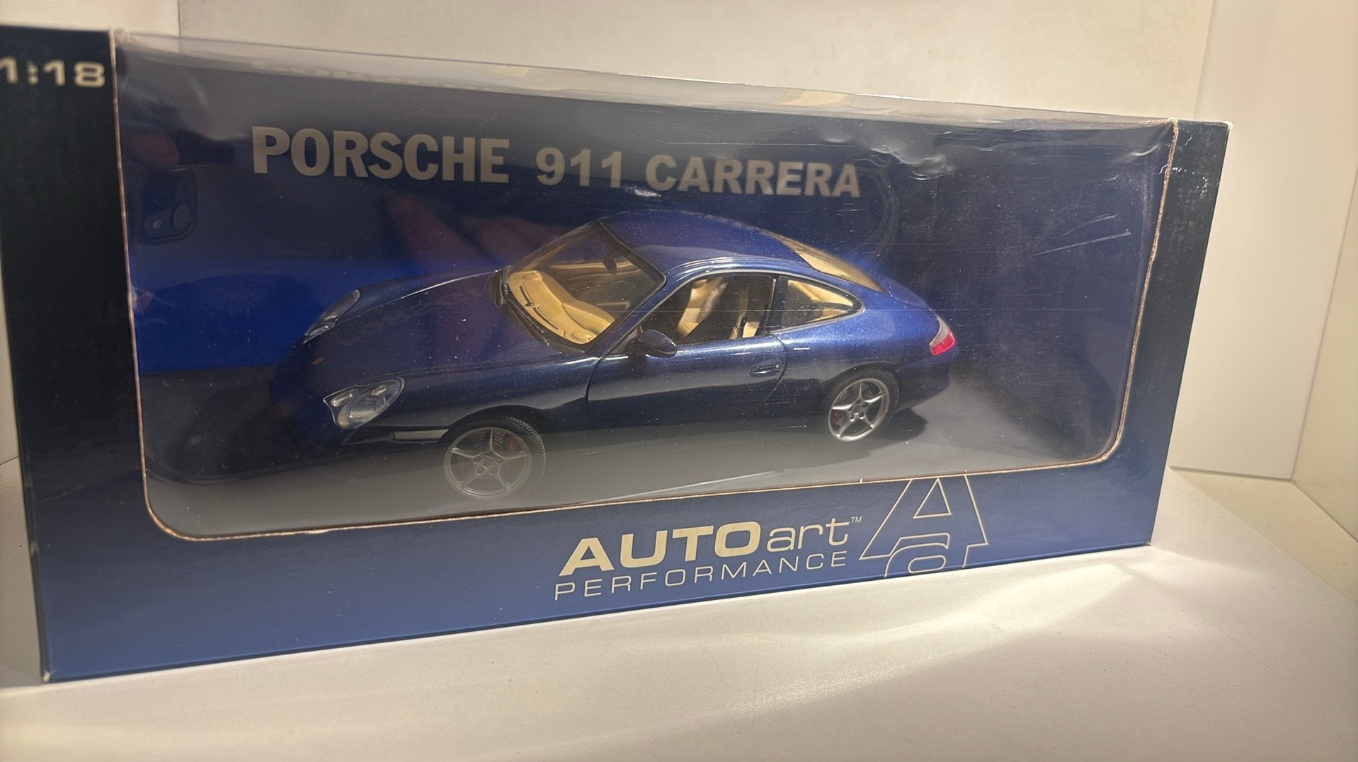 Porsche 911 carrera bleu autoart 1.18