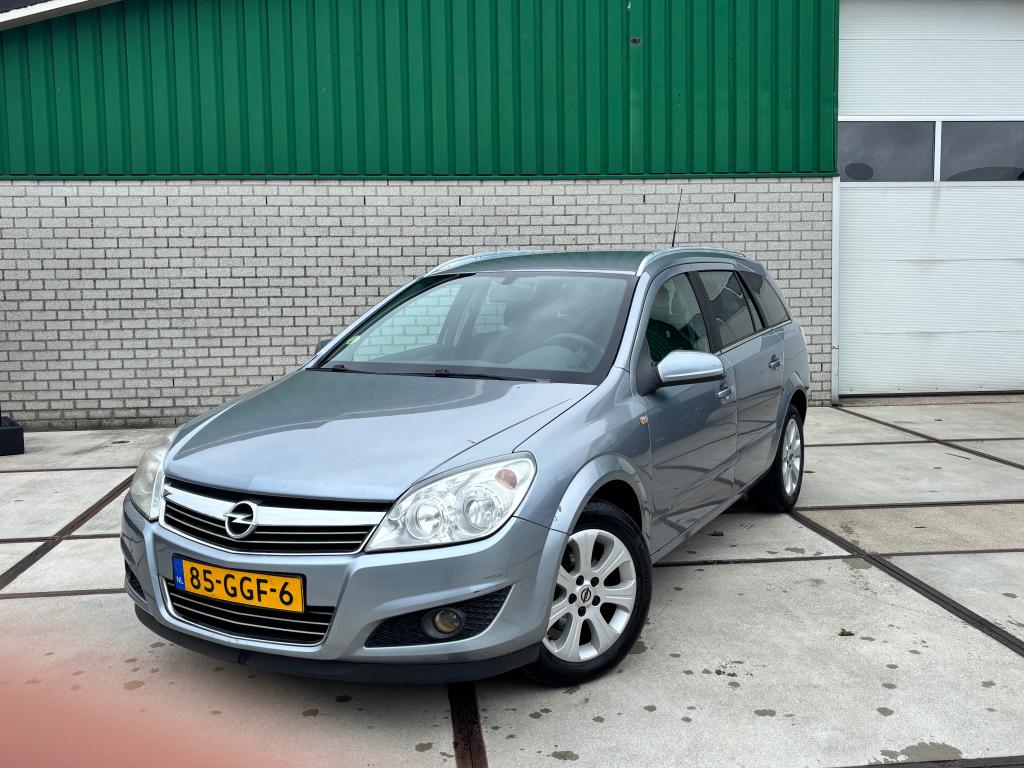 Opel Astra Station I 1.6 Benzine I APK Juli 2027 I Trekhaak, Voorwielaandrijving, 657 kg, Zwart, Origineel Nederlands