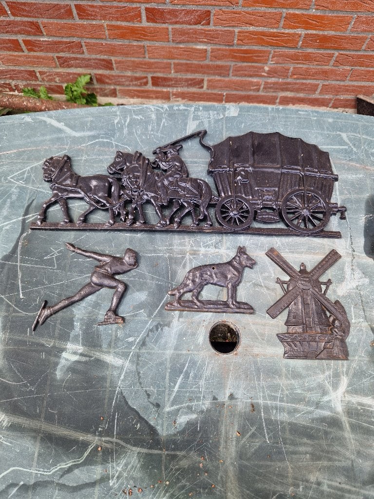 Gietijzeren muurbeeldjes, Ophalen, Gebruikt