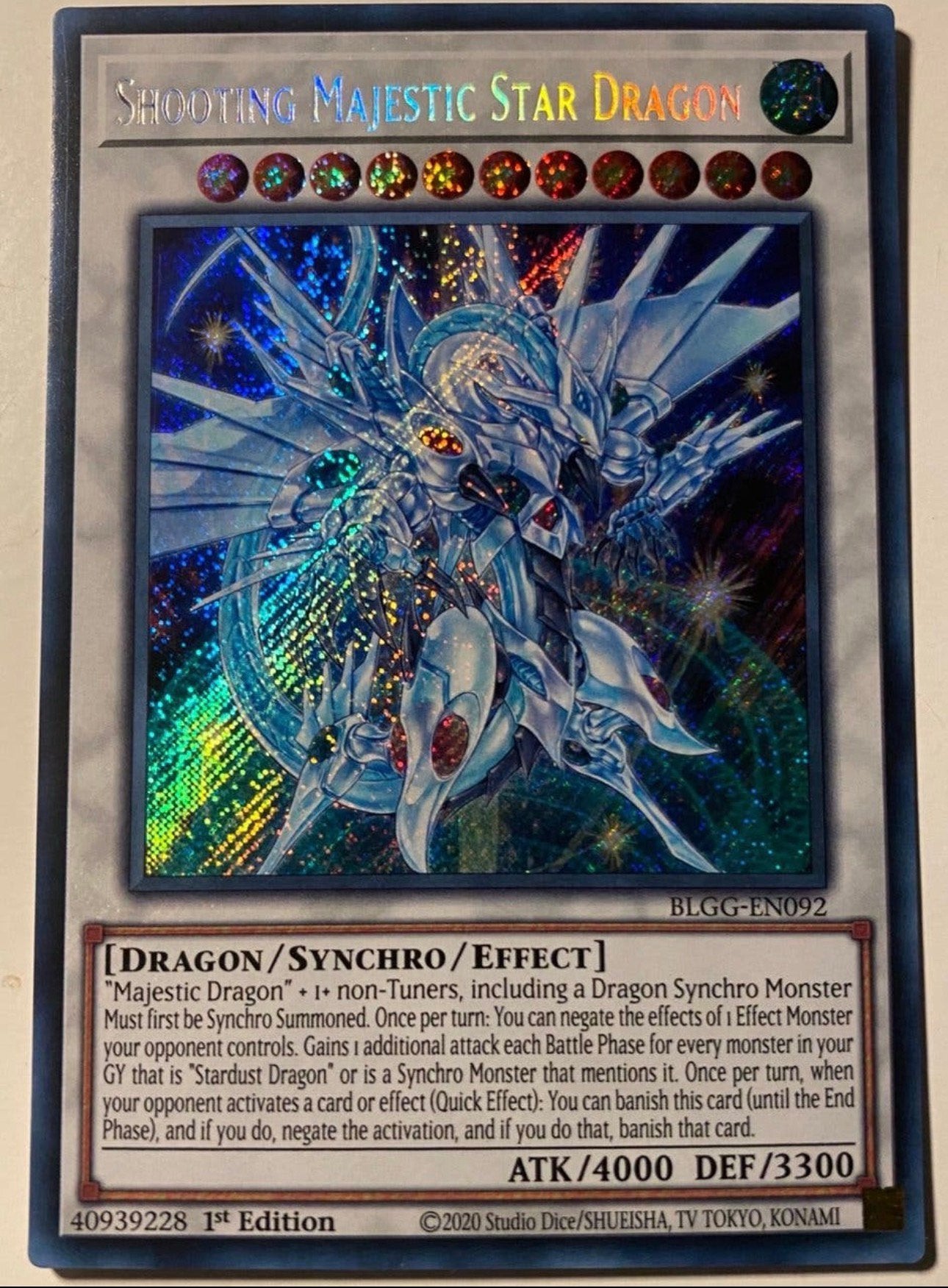 Yu-Gi-Oh! Shooting Majestic Star Dragon BLGG 1st Edition !, Ophalen of Verzenden, Zo goed als nieuw, Losse kaart, Foil