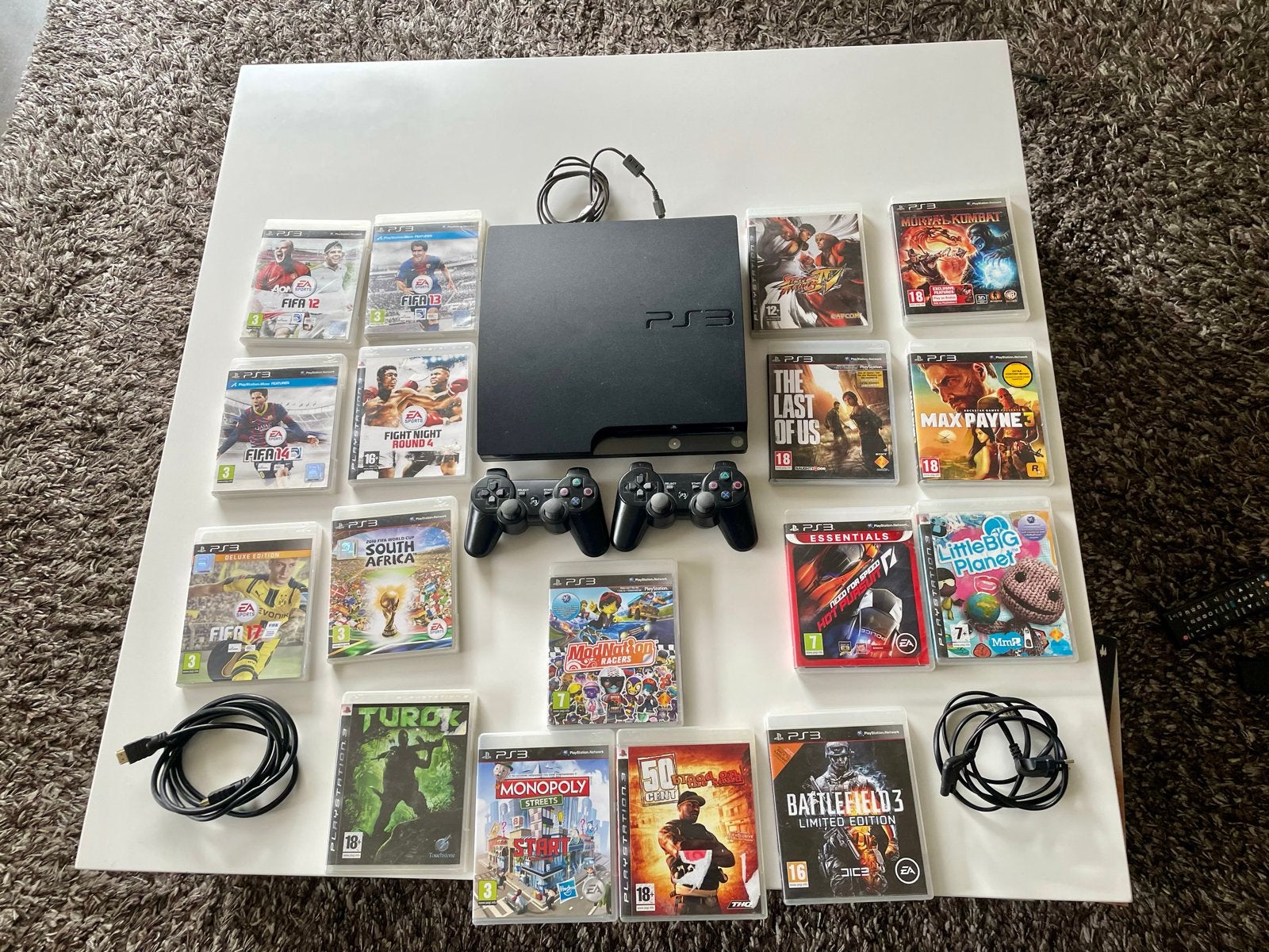 PlayStation 3 Slim met 15 games en 2 controllers, Spelcomputers en Games, Games | Sony PlayStation 3, Gebruikt, Vanaf 18 jaar