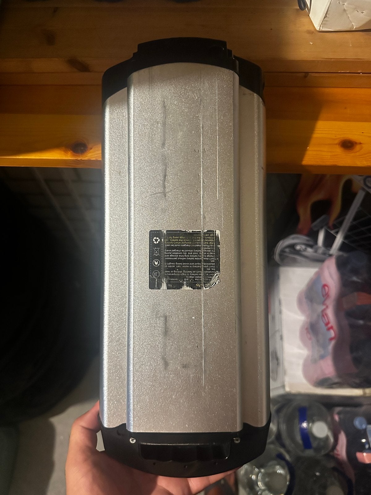 E-bike accu + oplader, beschadigd, Ophalen of Verzenden