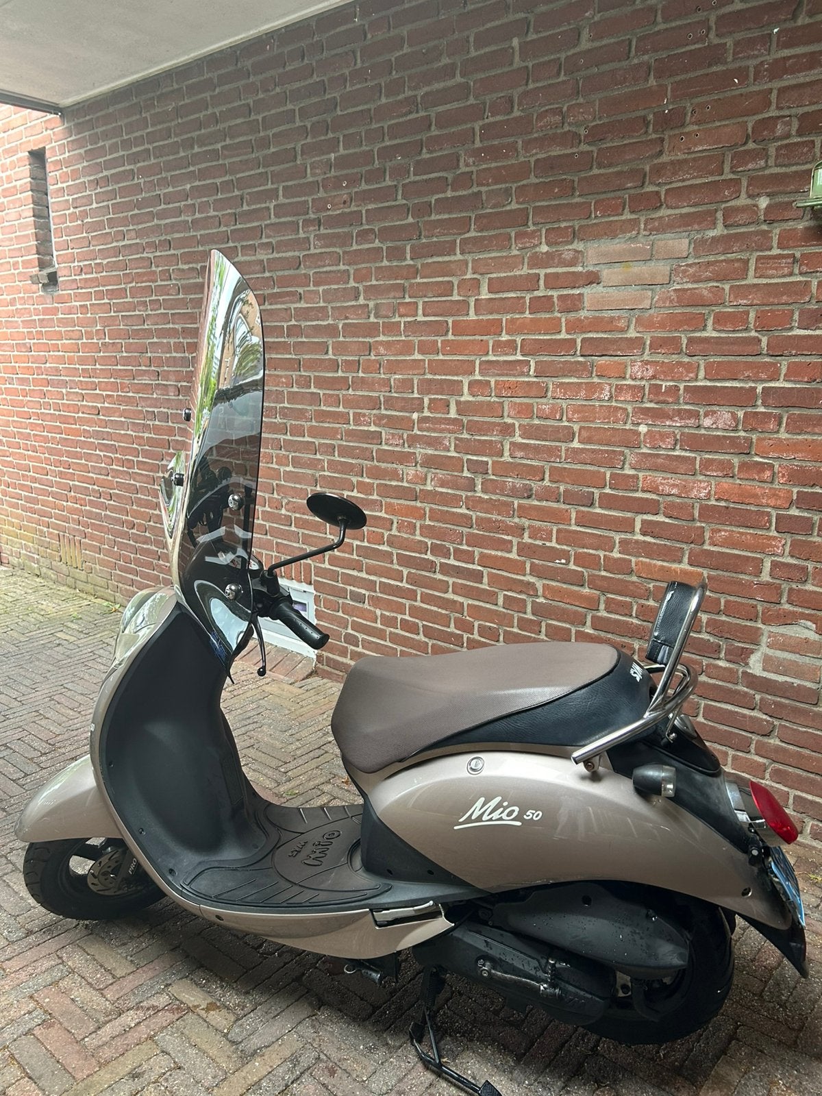 SYM Mio 50 (2013), Fietsen en Brommers, Scooters | SYM, Gebruikt, Benzine, Maximaal 25 km/u, Ophalen