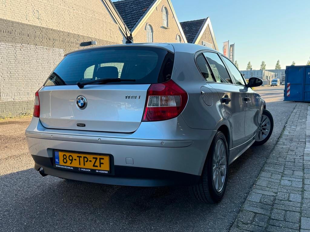 BMW 1-serie 118i Business Line Automaat, Auto's, BMW, Achterwielaandrijving, Huisgarantie, 4 cilinders, Origineel Nederlands