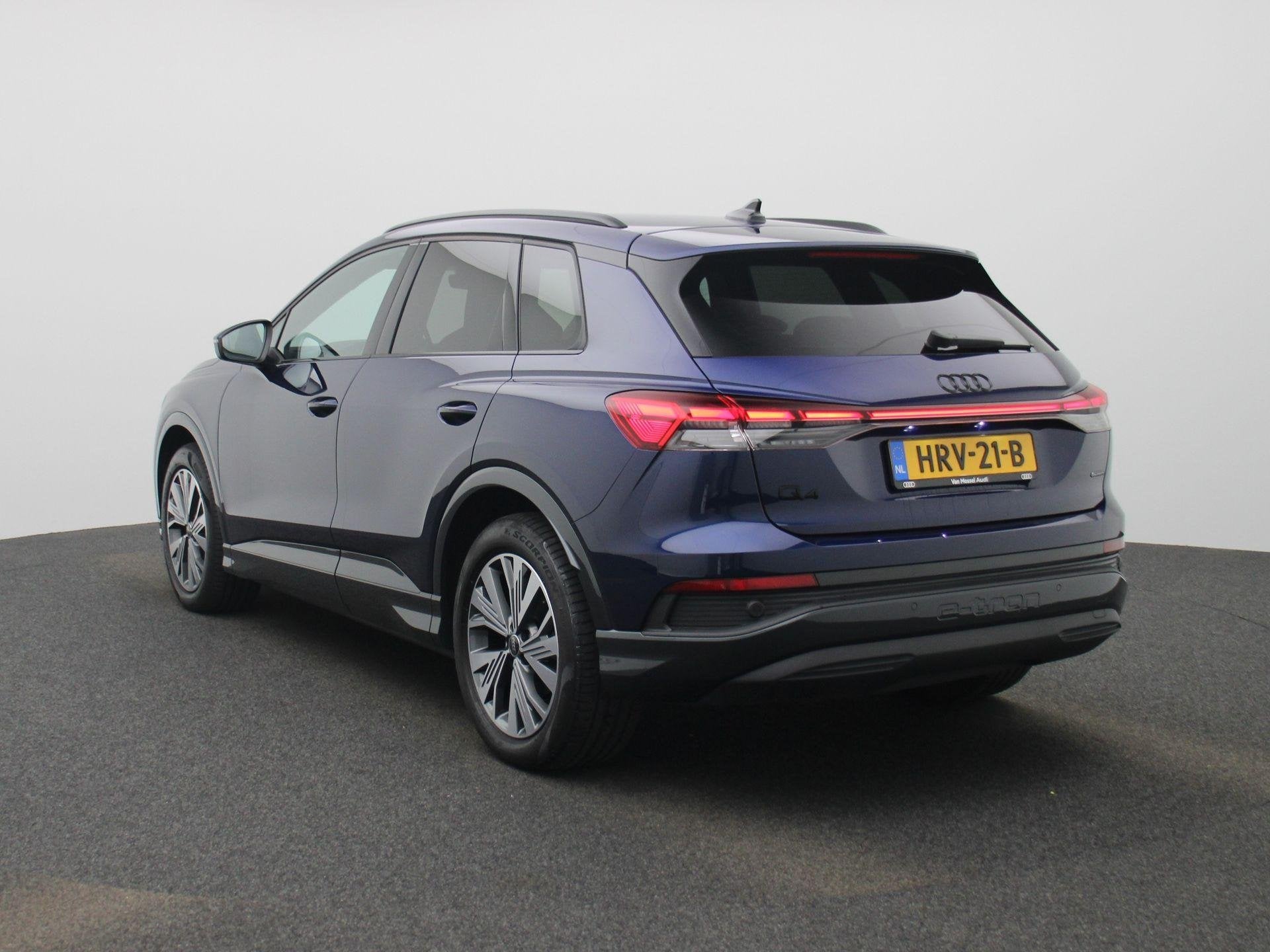 Audi Q4 e-tron 45 quattro Advanced edition 82 kWh l Demo l A, Auto's, 12 maanden, Stof, Zwart, 82 kWh