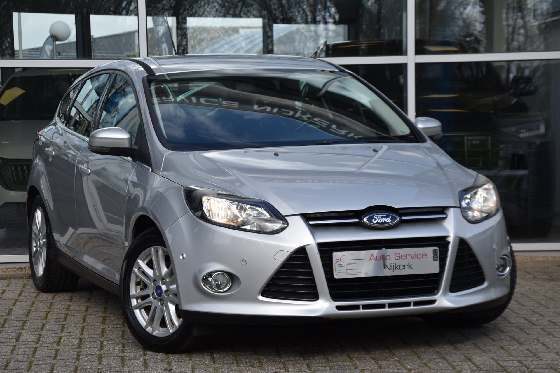 Ford Focus 1.0 EcoBoost Titanium Navi Cruise PDC Trekhaak De, Gebruikt, Zwart, 635 kg, Bedrijf