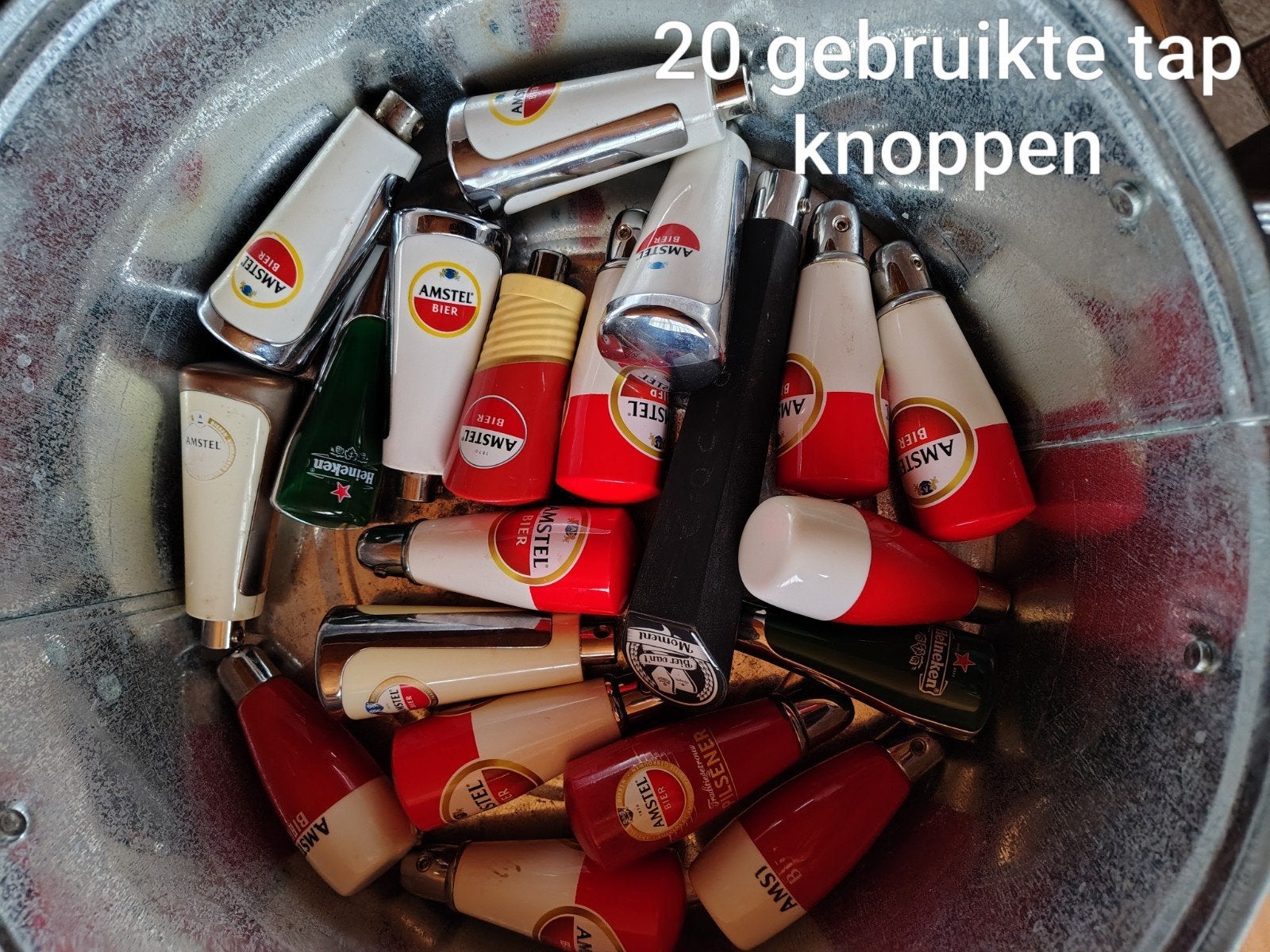 Gebruikte Amstel Tapknoppen/hendels 20 Stuks, Ophalen of Verzenden, Gebruikt, Amstel