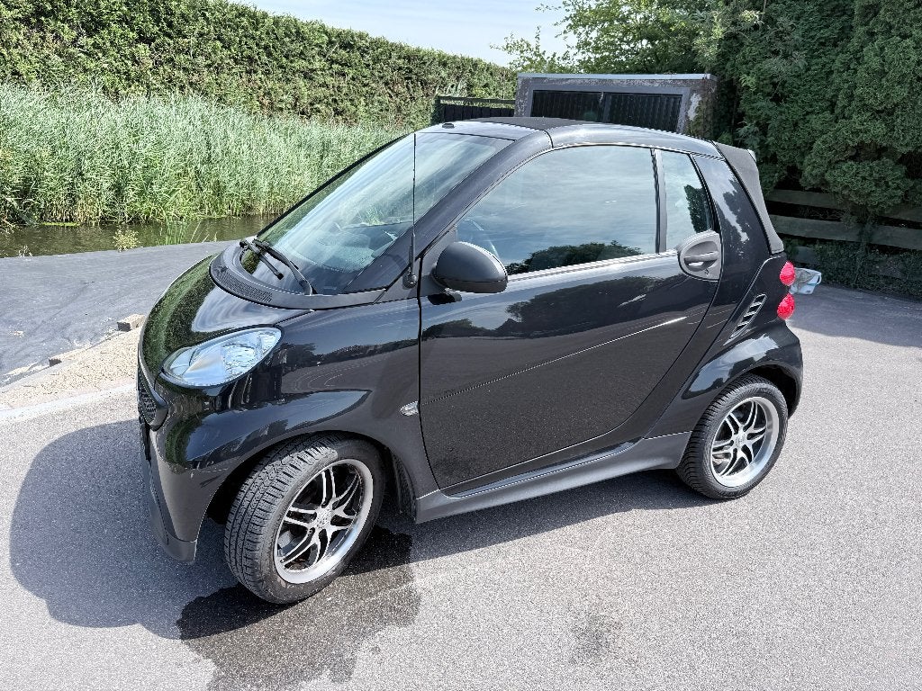 Smart ForTwo 1.0 52KW Cabrio MHD AUT 2012 Zwart, Auto's, Smart, Stof, Zwart, 755 kg, Origineel Nederlands