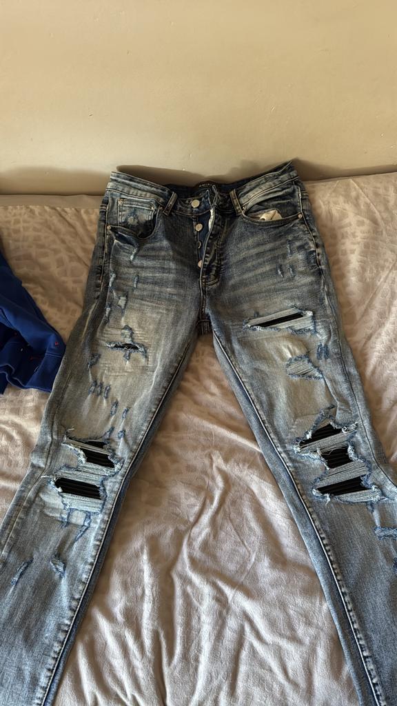 Stijlvolle gescheurde jeans Amiri, Ophalen of Verzenden, Gedragen, Blauw, W32 (confectie 46) of kleiner
