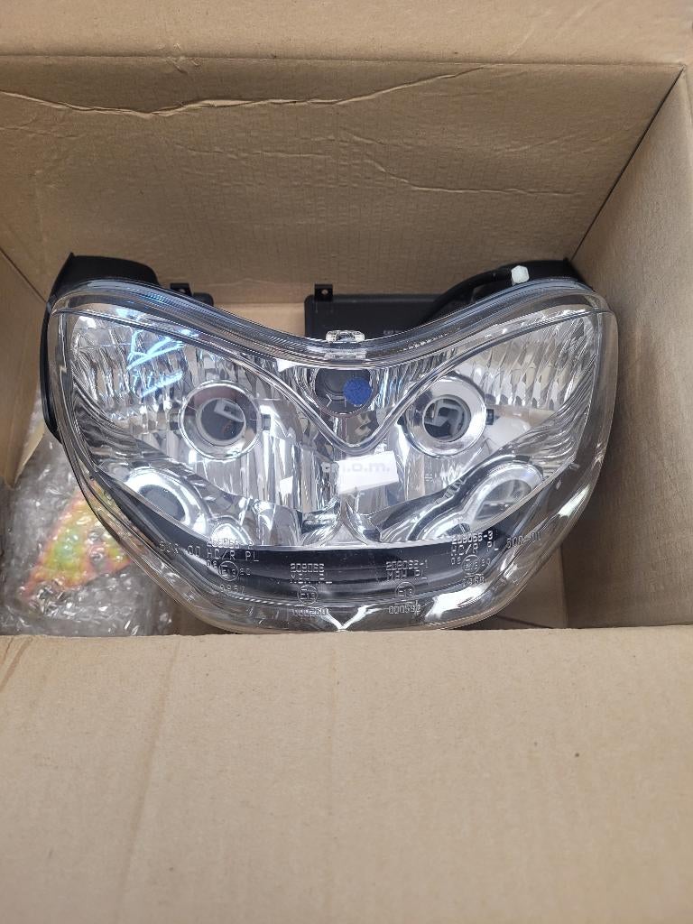 Originele koplamp Gilera DNA, Fietsen en Brommers, Ophalen of Verzenden, Nieuw, Koplamp, Gilera