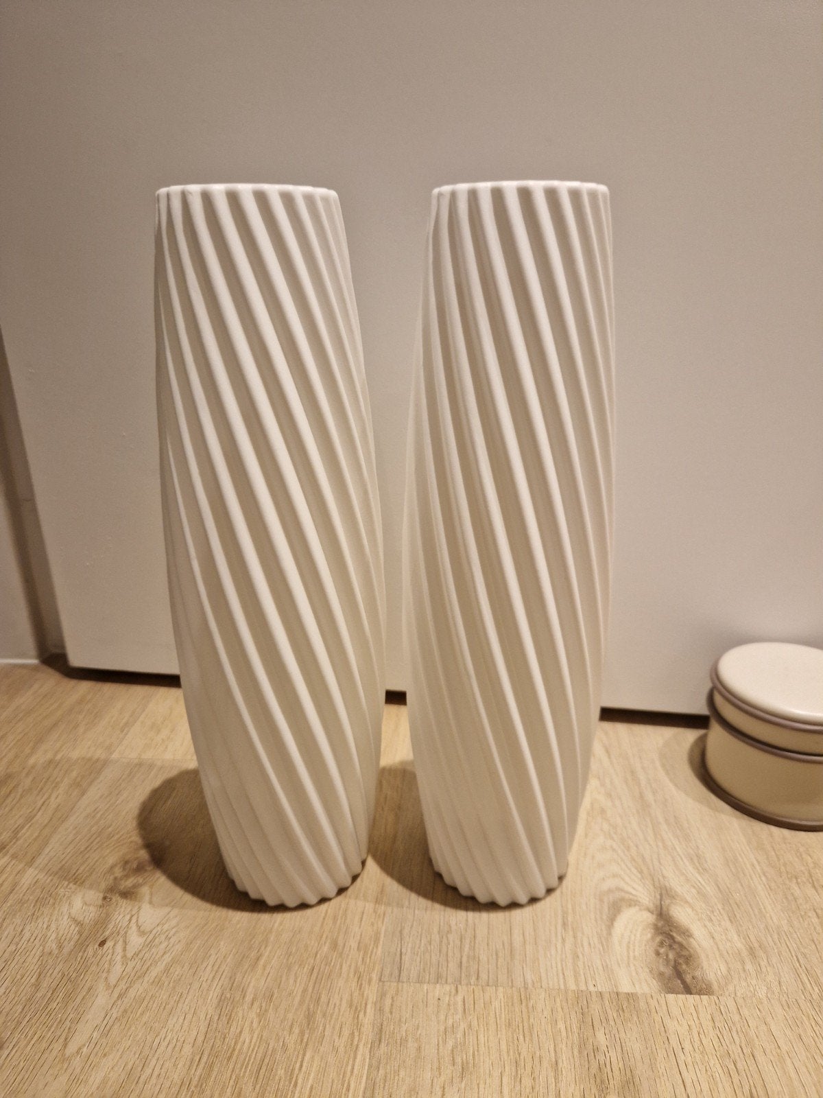 witte vazen, Ophalen