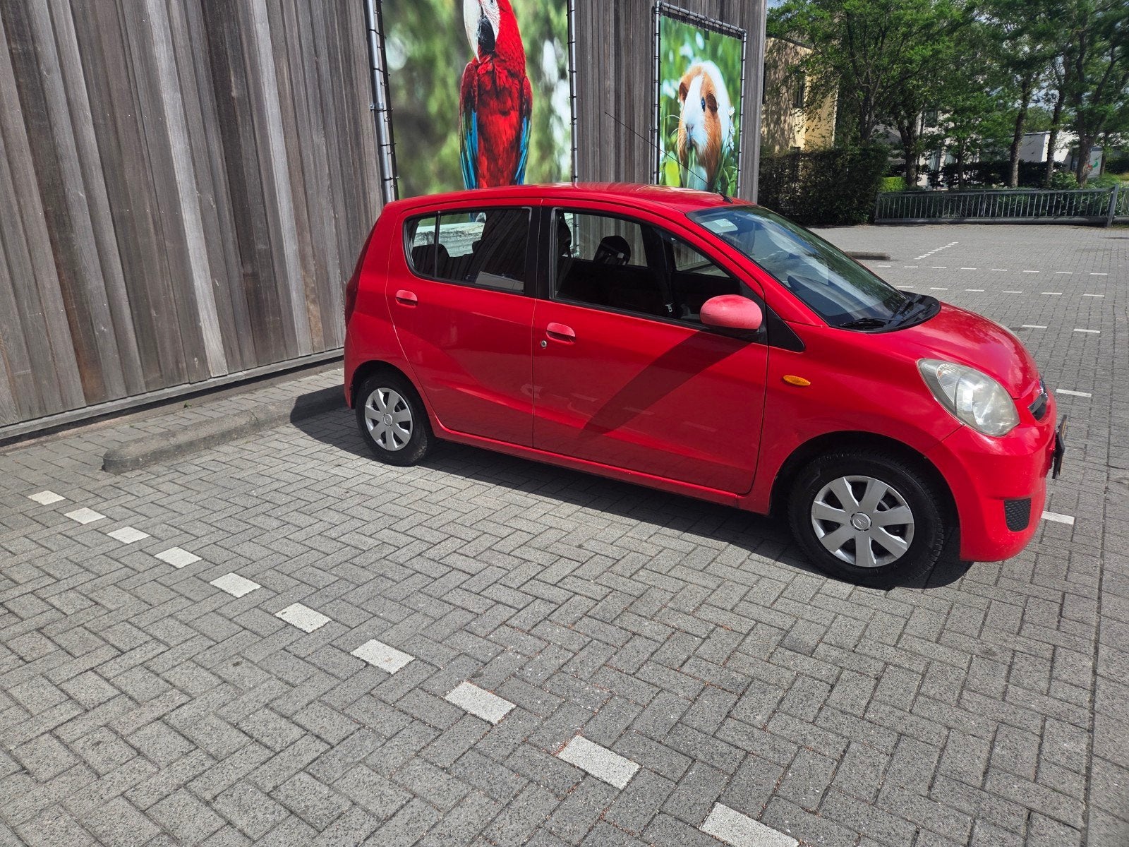 Daihatsu Cuore 1.0 5D 2008 Rood    apk nieuw 2027, Auto's, Voorwielaandrijving, 600 kg, 18 €/maand, 4 stoelen