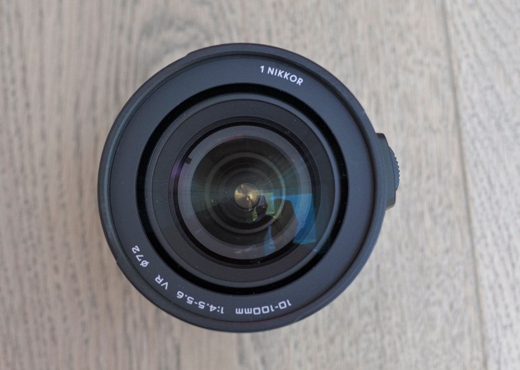 Nikon 1 - 10-100mm PD VR zoom, Beeldstabilisatie, Ophalen of Verzenden, Zo goed als nieuw, Nikon