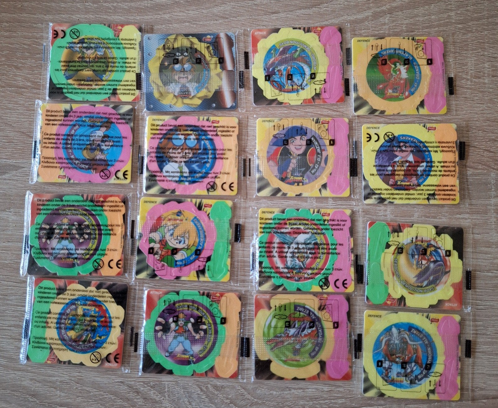 27 Beyblade Spinners Tazos Series, in verpakking, Ophalen, Losse flippo's