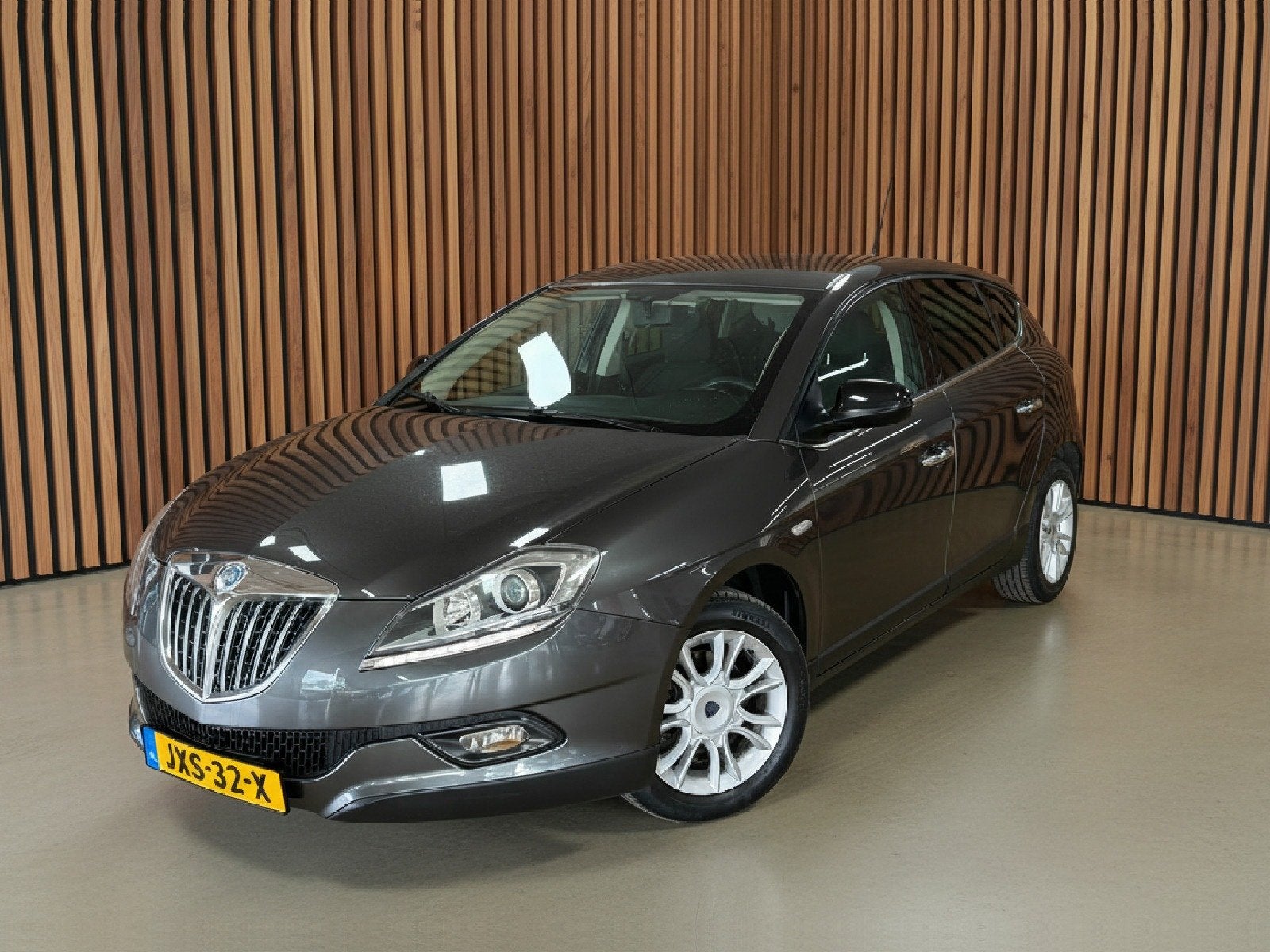Lancia Delta 1.4-16V Argento | Airco | Multimedia | Camera, Auto's, Voorwielaandrijving, Gebruikt, 1295 kg, 4 cilinders