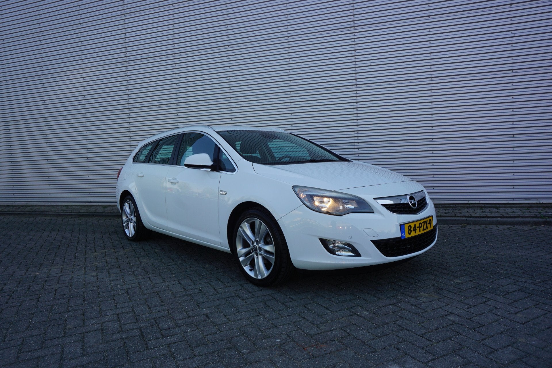 Opel Astra Sports Tourer 1.4 Turbo Sport Airco / Cruise / Na, Voorwielaandrijving, Euro 5, Gebruikt, 4 cilinders
