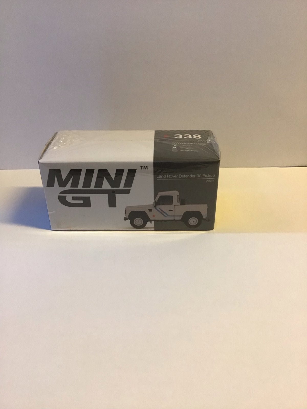 Mini GT Land Rover Defender 90 Pickup Wit Modelauto nr.338, Ophalen of Verzenden, Nieuw, Auto