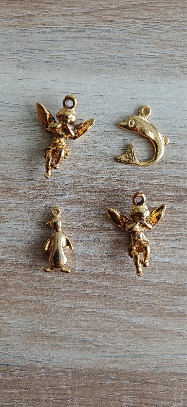 Gouden bedels: engel, dolfijn, pinguïn - set van 4, Ophalen of Verzenden, Zo goed als nieuw, Goud, Overige merken