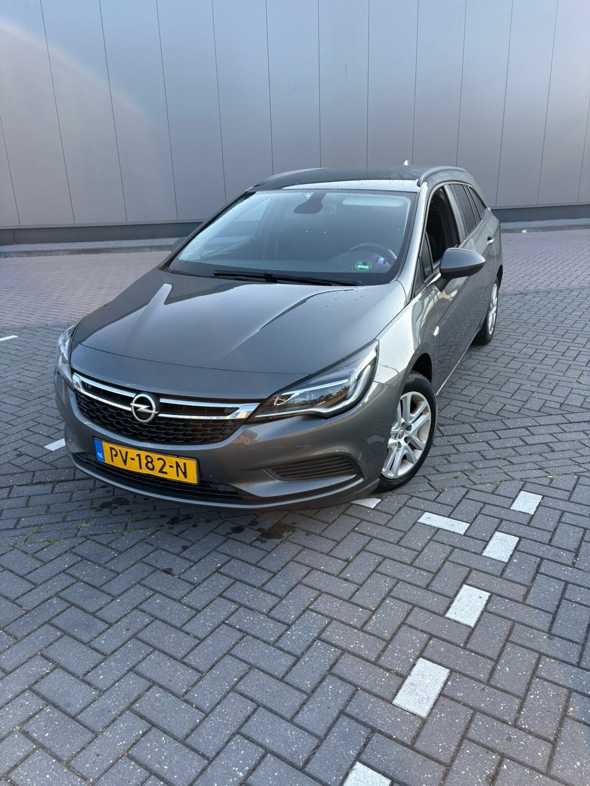 Opel Astra 1.0 Turbo 77KW Sports Tourer 2017 Grijs, Voorwielaandrijving, Stof, 1178 kg, 620 kg