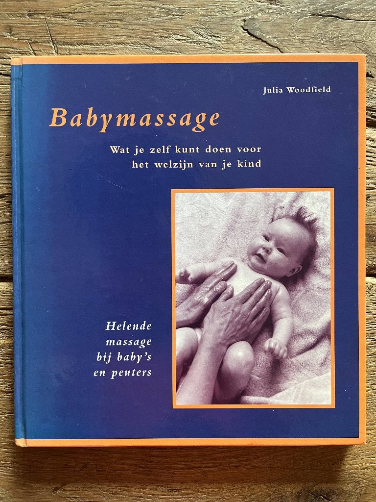 Boek babymassage van Julia Woodfield, Ophalen of Verzenden, Zo goed als nieuw