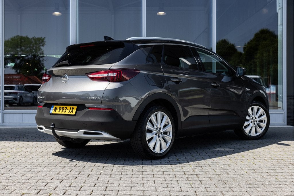 Opel Grandland X 1.6 Turbo Hybrid4 Ultimate | Trekhaak | Cam, Auto's, Opel, 12 maanden, 77 km/l, 4 cilinders, Leder en Stof