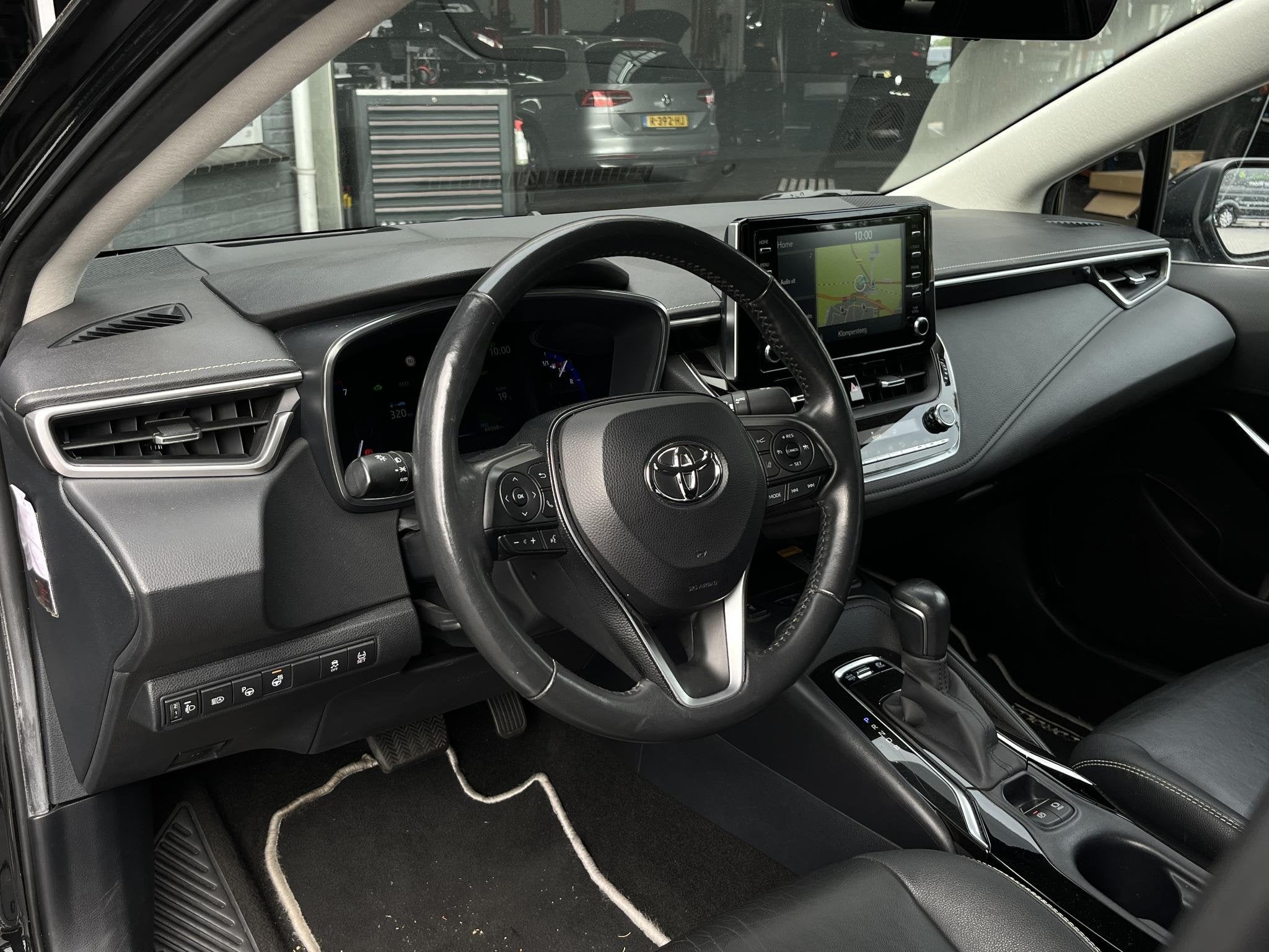 Toyota Corolla 1.8 Hybrid Executive HUD, Stoel/Stuurwiel ver, Auto's, Toyota, 450 kg, Gebruikt, 4 cilinders, Corolla