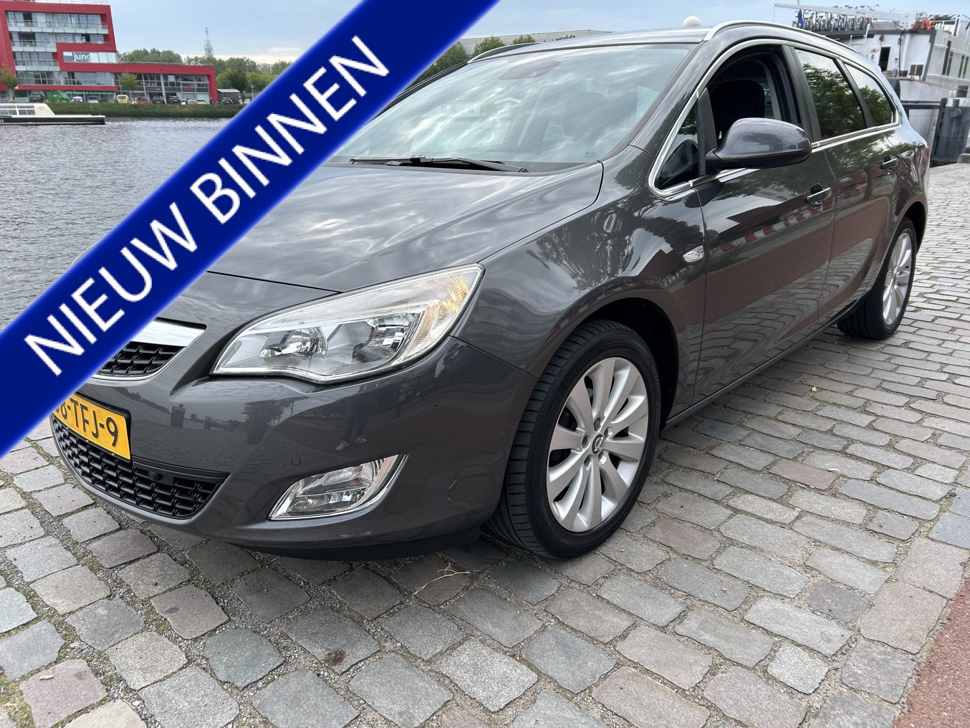 Opel Astra Sports Tourer 1.4 Turbo Cosmo navigatie airco/ecc, Auto's, Voorwielaandrijving, Euro 5, Stof, Gebruikt