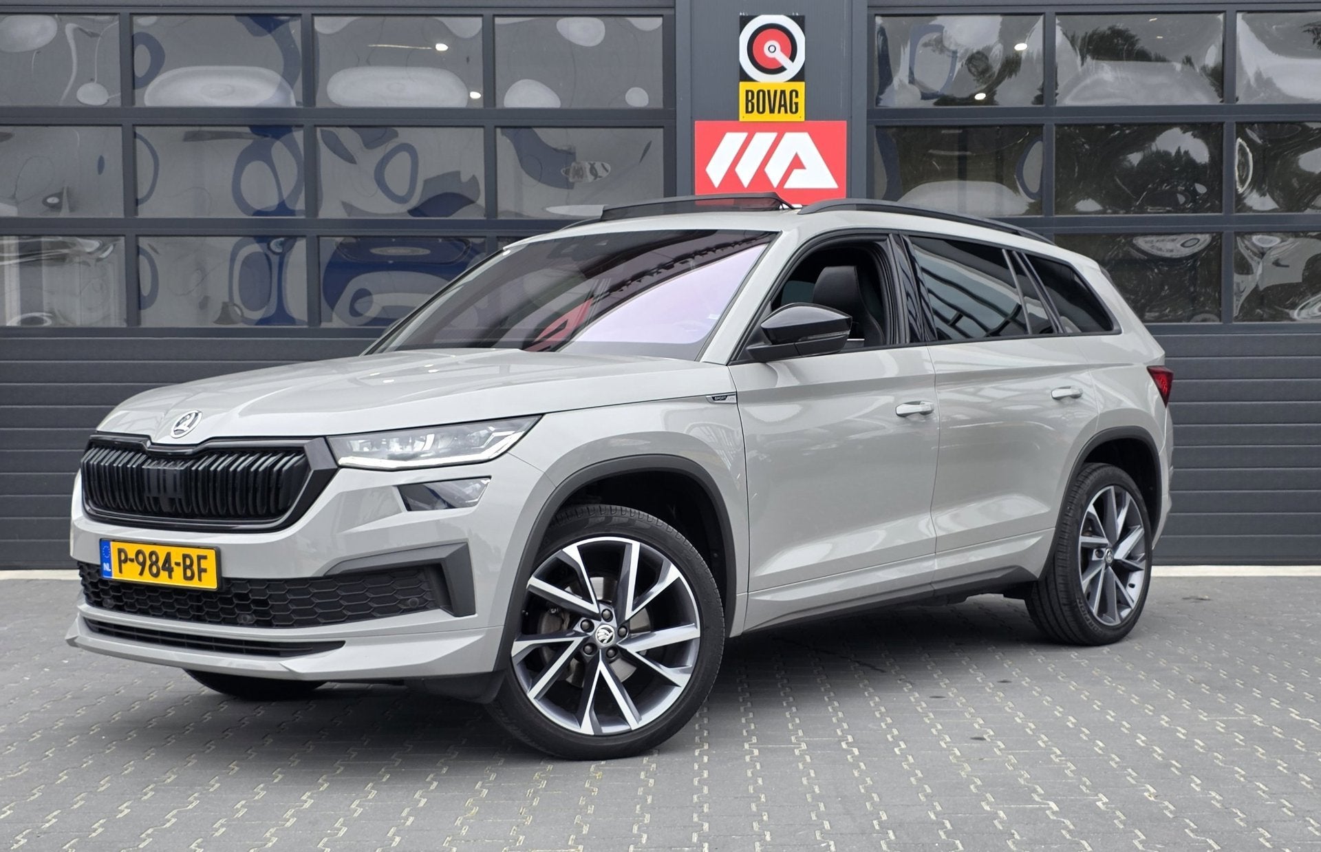 Skoda Kodiaq 1.5 TSI Sportline Business 7P | FULL OPTION | L, Auto's, Dealer onderhouden, 1566 kg, 4 cilinders, 150 pk