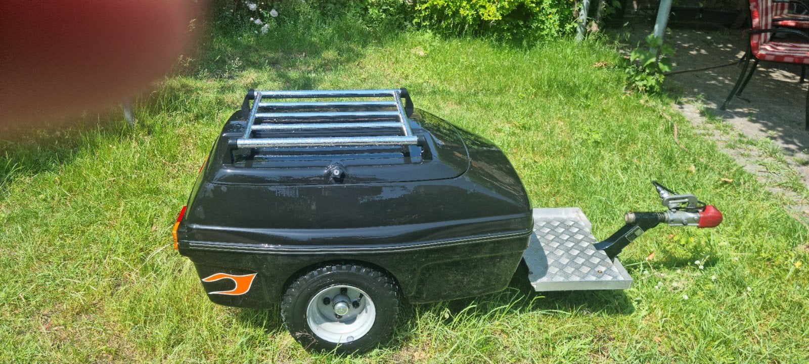 Aanhanger achter motor, Ophalen