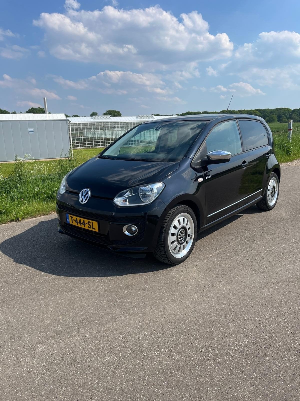 Volkswagen up! 1.0 44KW 2012 Zwart, Auto's, Voorwielaandrijving, Up!, 4 stoelen, Leder en Stof
