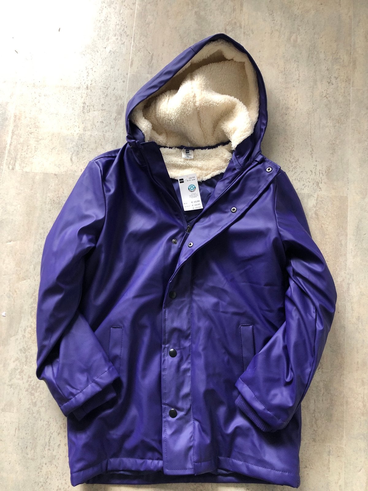 Nieuwe Hema paarse regenjas met teddy voering, maat 146/152, Ophalen of Verzenden, Nieuw, Jongen of Meisje
