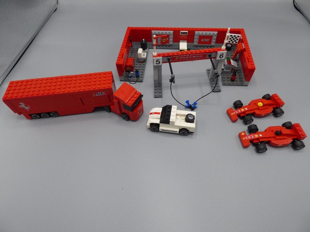lego 8155 Ferrari Formule 1 Pitstop Raikonen en Massa, Compleet, Gebruikt, Lego, Ophalen of Verzenden