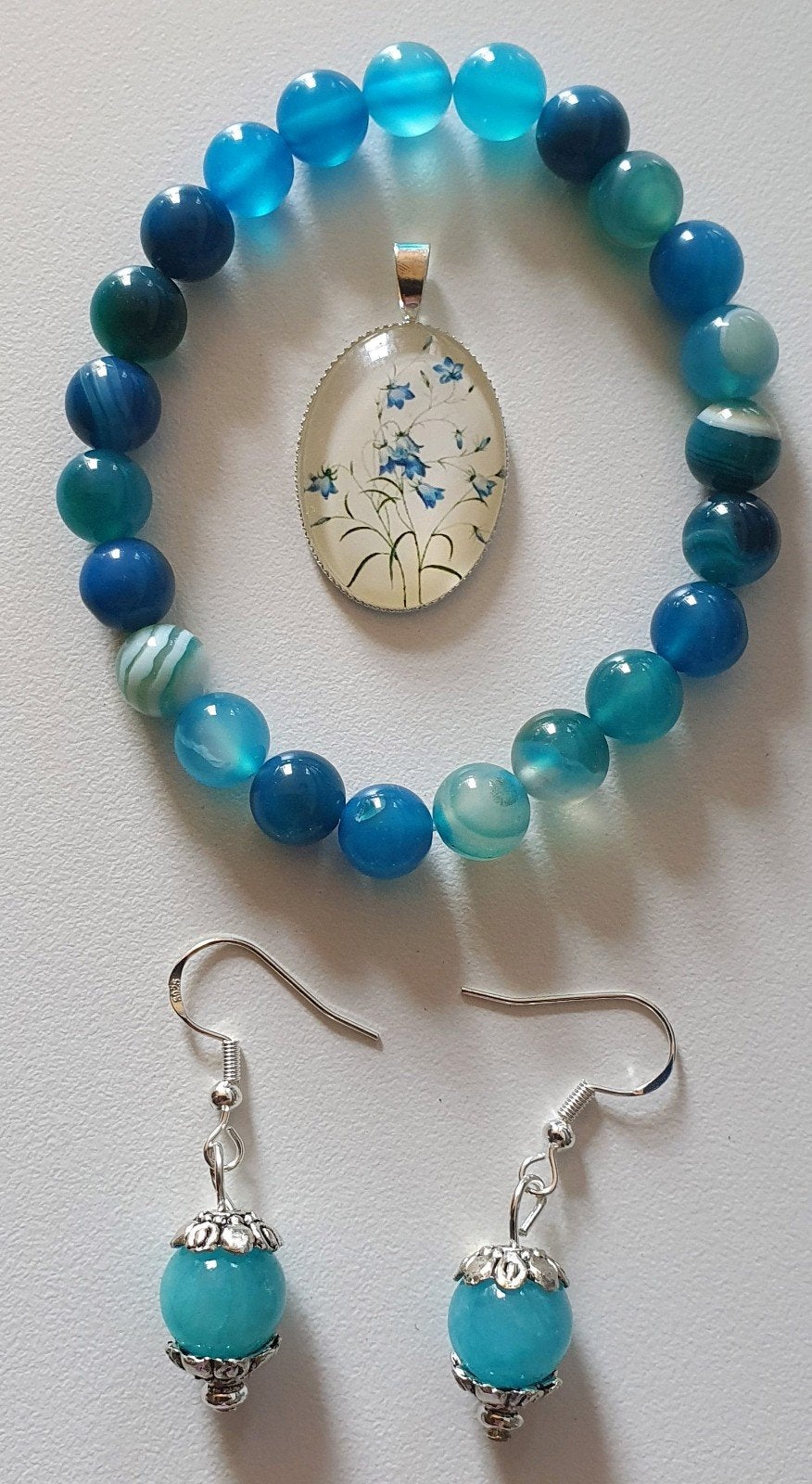 Turquoise natuursteen set armband en oorbellen, Ophalen of Verzenden, Nieuw, Blauw, Zilver