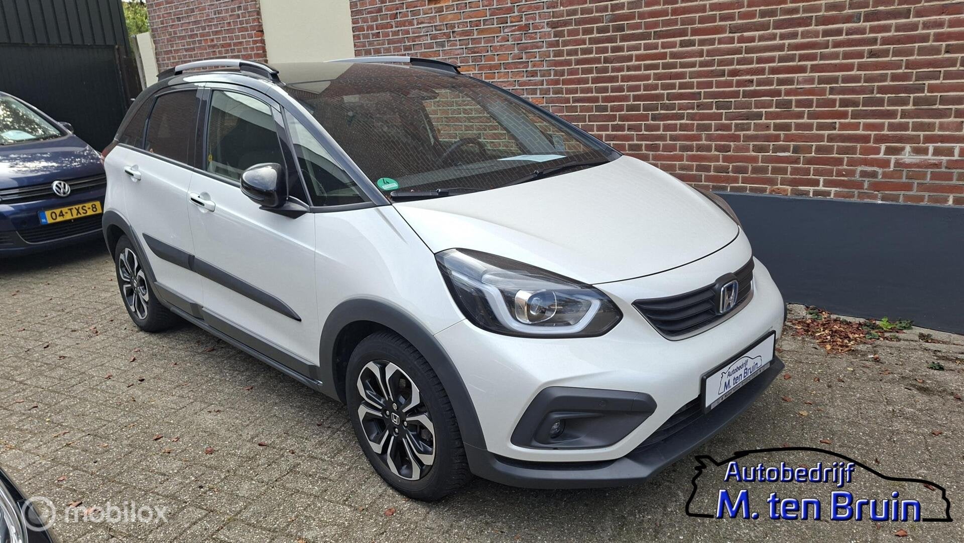 Honda Jazz 1.5 e:HEV Crosstar Two-tone (zwart dak), Auto's, 4 cilinders, 1253 kg, Bedrijf, Hybride Elektrisch/Benzine