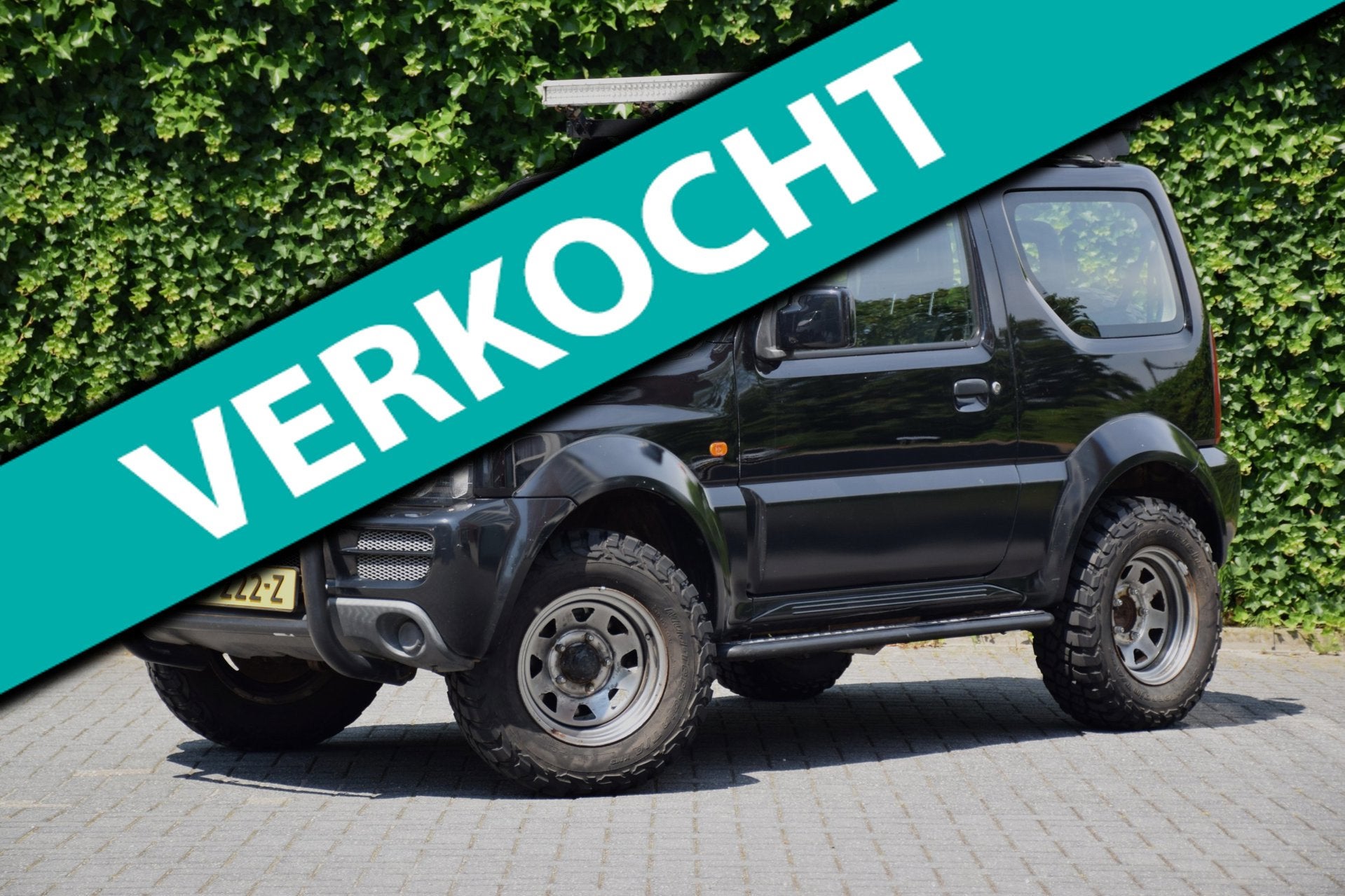 Suzuki Jimny 1.3 JLX Airco/Garantie/Compleet aangepast/Verho, Keurmerk '100% Onderhouden', 12 maanden, Zwart, 4 stoelen