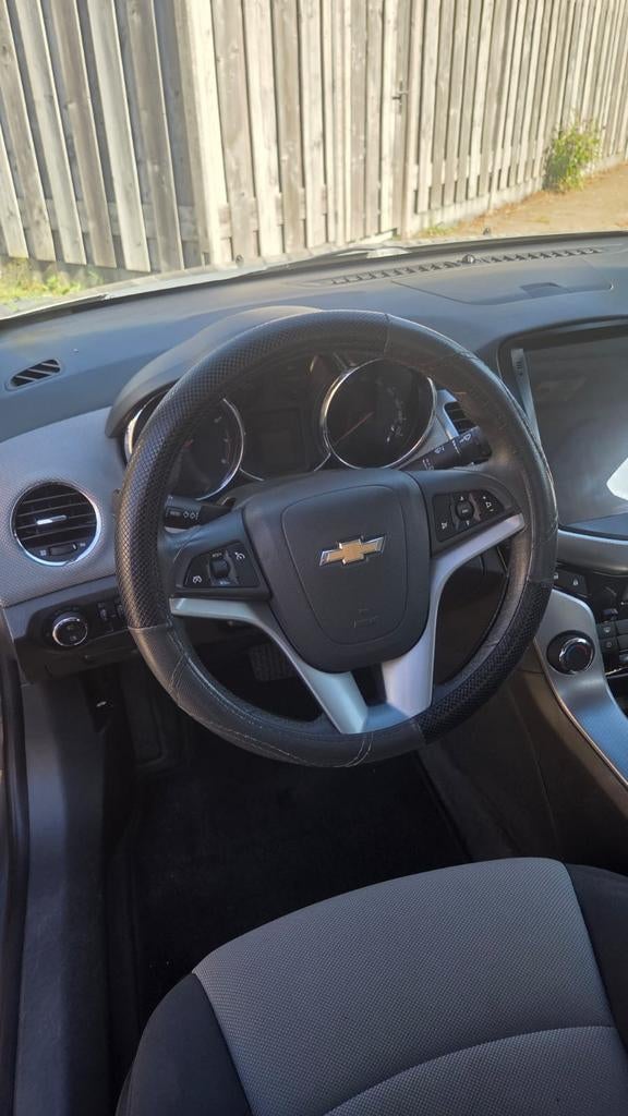 Chevrolet Cruze 1.8 AUT 2010 Grijs 149000 NAP, Auto's, 4 cilinders, 1290 kg, 1796 cc, Origineel Nederlands