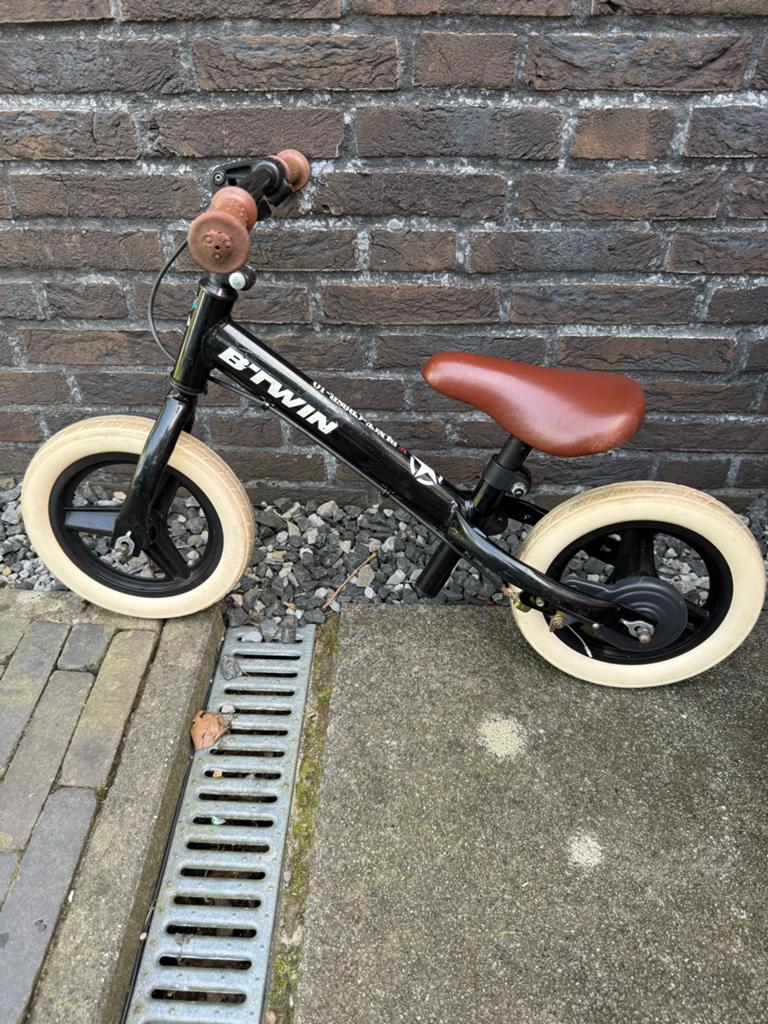 Btwin loopfiets zwart bruin, Ophalen, Gebruikt, Loopfiets