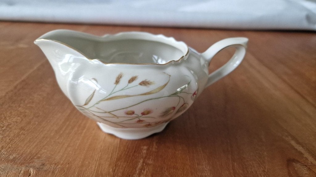 Spenzo melk/saus kannetje met gouden randje., Overige typen, Ophalen of Verzenden, Zo goed als nieuw, Wedgwood