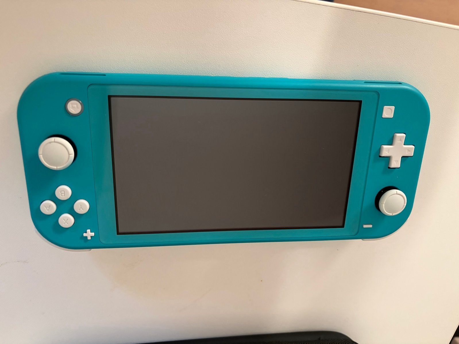 Nintendo Switch Lite Turquoise + 128GB SD-kaart + Hoes, Ophalen of Verzenden, Zo goed als nieuw
