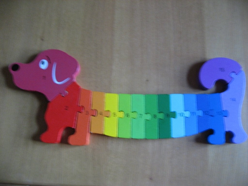 houten puzzel ( teckel) om te leren tellen, 2 tot 4 jaar, 10 tot 50 stukjes, Ophalen of Verzenden, Zo goed als nieuw