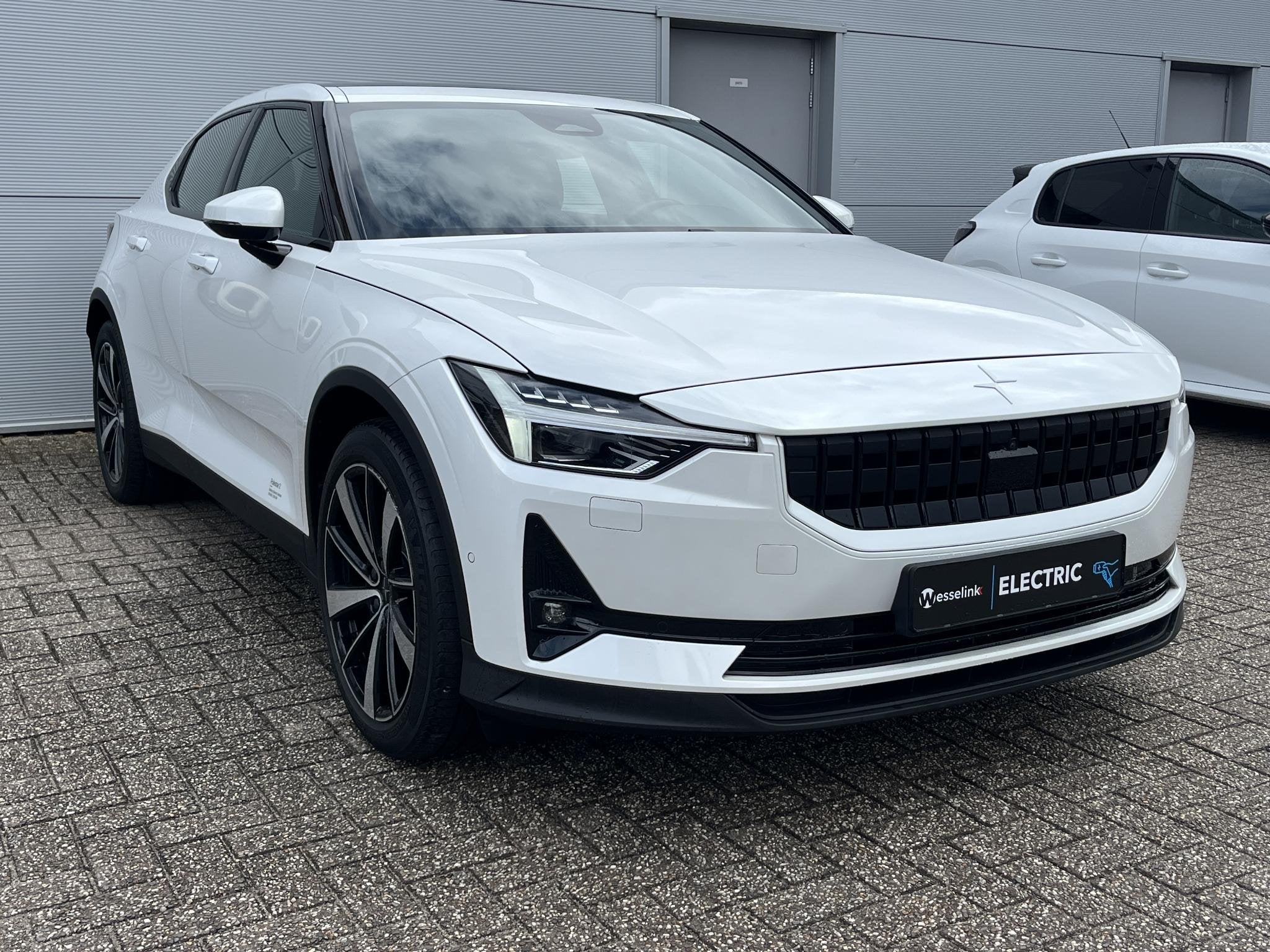 Polestar 2 Long Range Dual Motor Launch Edition 78kWh - SOH, Auto's, Polestar 2, Stof, Gebruikt, Wit
