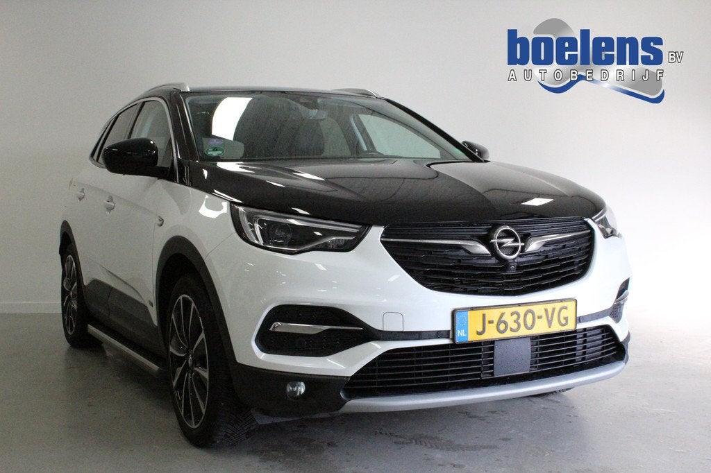Opel Grandland X 1.6 Turbo Hybrid4 Ultimate | STOEL/VERW+KOE, Auto's, Opel, Automaat, 77 km/l, 4 cilinders, Wit