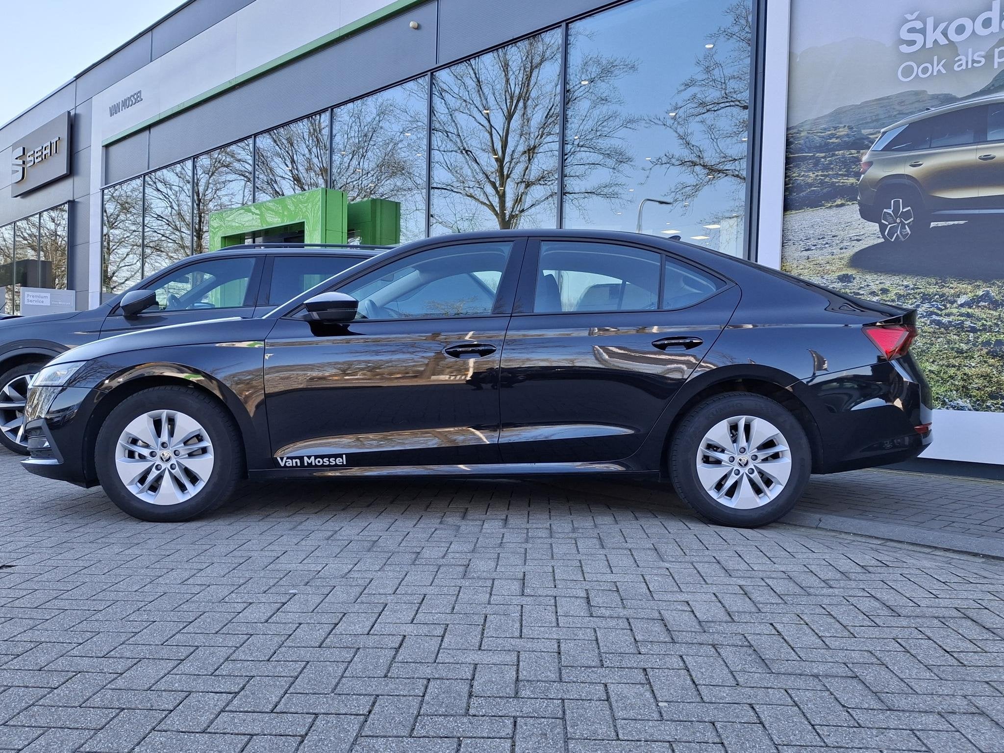 Skoda Octavia 1.0 e-TSI Ambition | STOELVERWARMING | PARKEER, Auto's, 12 maanden, Stof, Gebruikt, Zwart