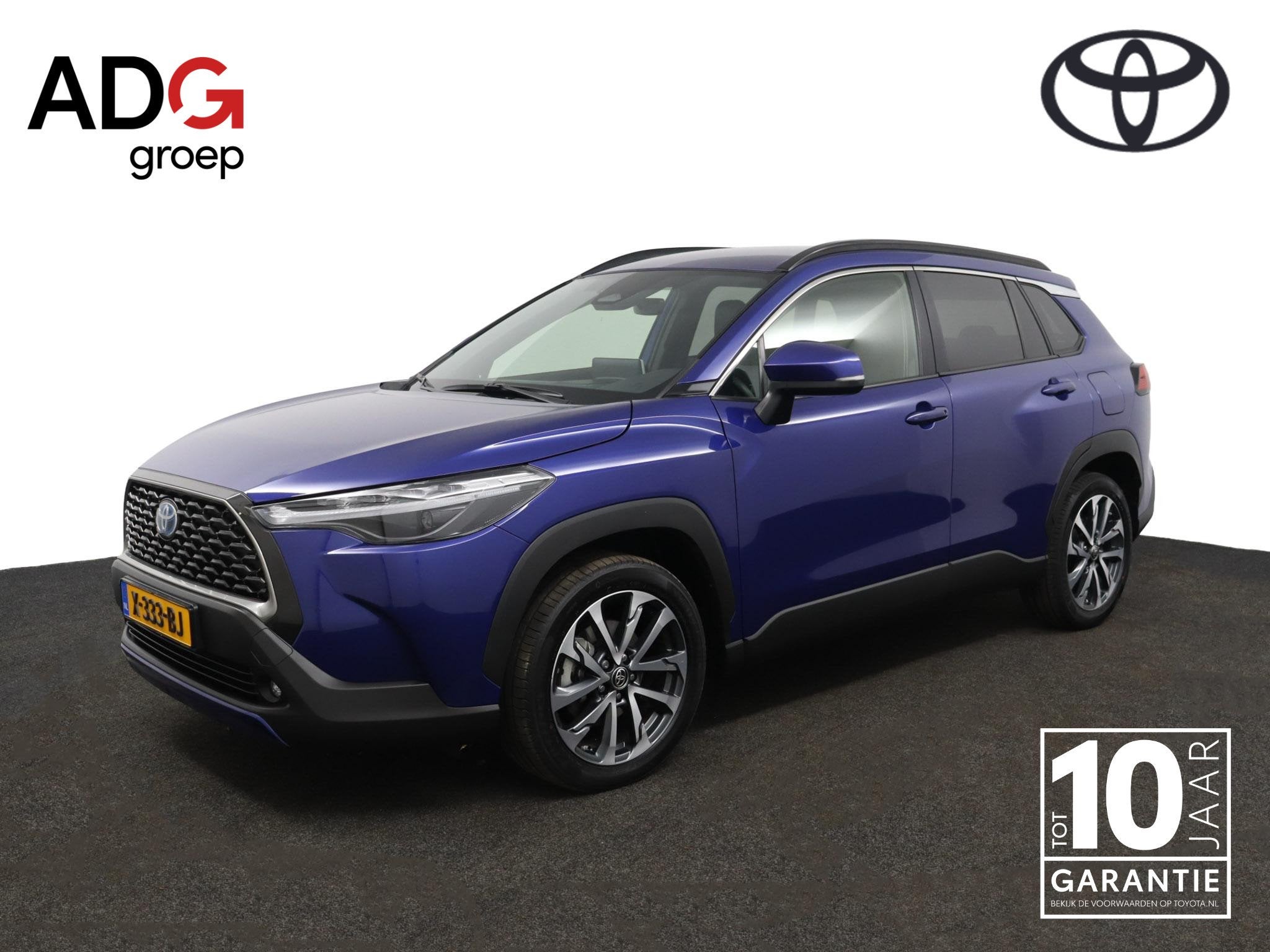 Toyota Corolla Cross Hybrid 200 Style | Stoelverwarming | Pa, Gebruikt, 4 cilinders, Blauw, Leder en Stof
