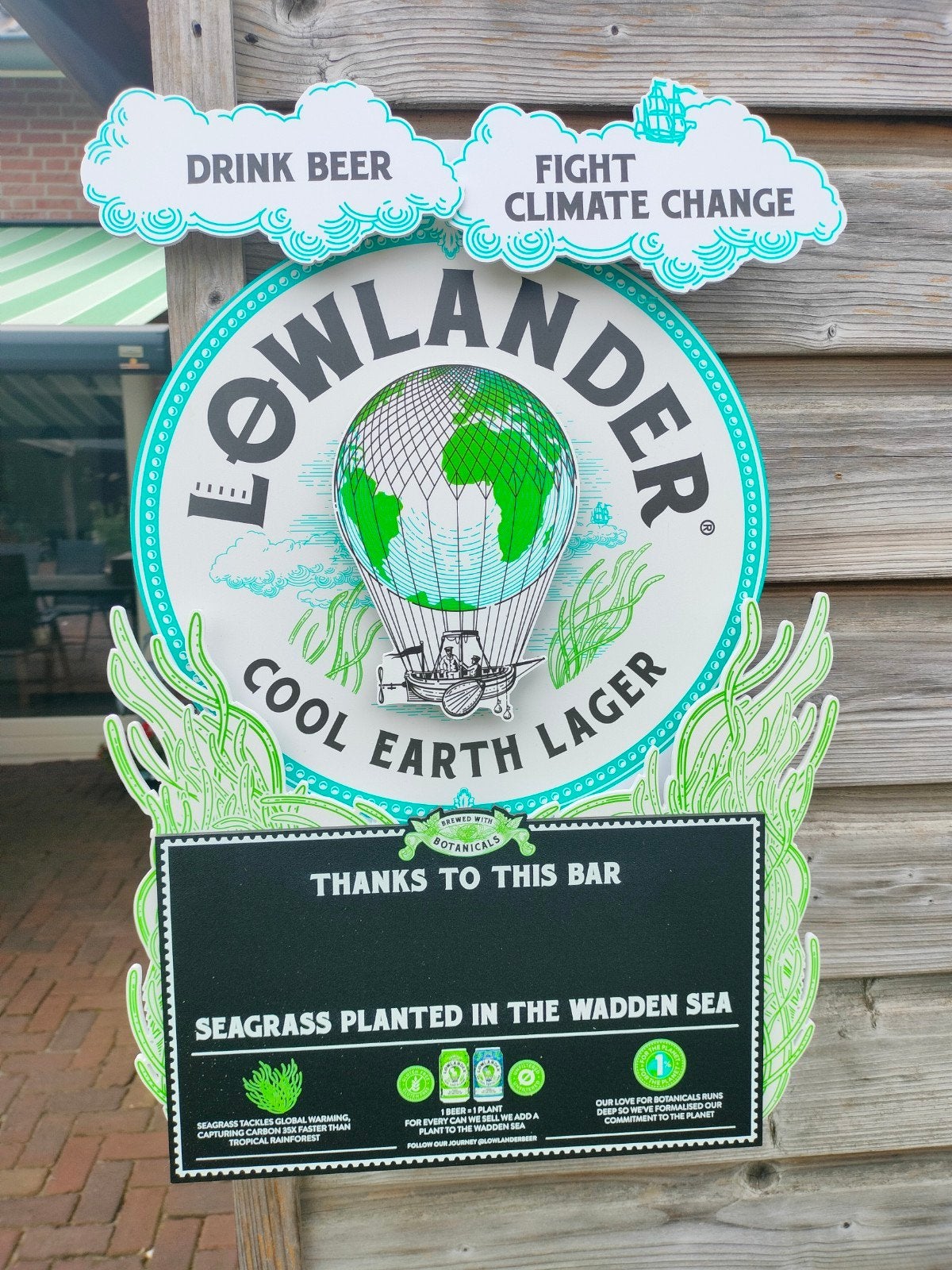 Lowlander Cool Earth Lager Reclamebord/Display, Ophalen, Nieuw, Reclamebord