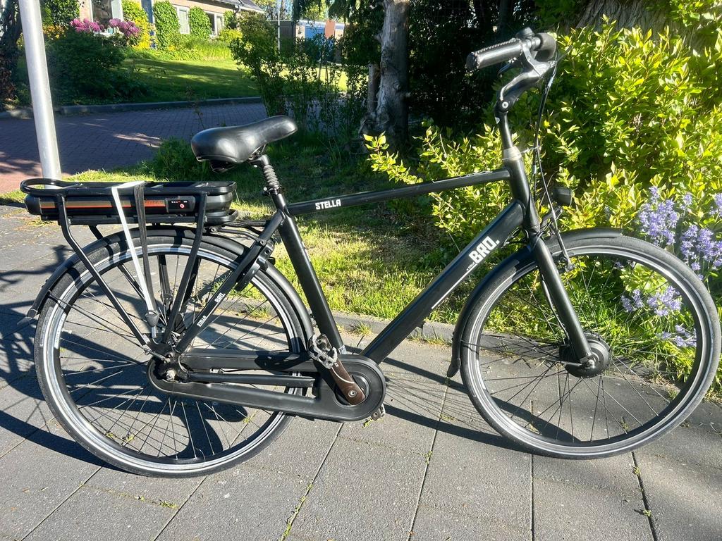 Zeer nette Stella Bro elektrische herenfiets - Zo goed als n, Zo goed als nieuw, 50 km per accu of meer, 55 tot 59 cm, Ophalen