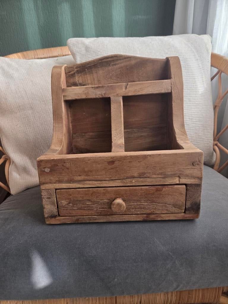 Houten grutters bak, Ophalen