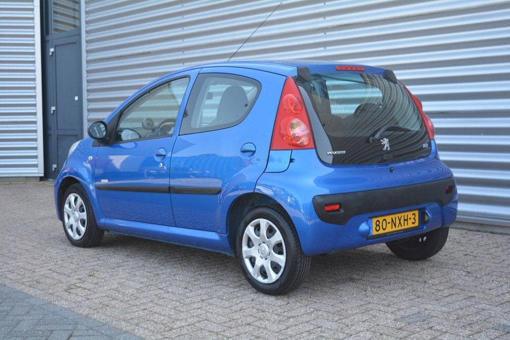 Peugeot 107 1.0-12V Millesim 200 Airco/5Drs/Org NL, Auto's, Voorwielaandrijving, Euro 5, Gebruikt, Metallic lak