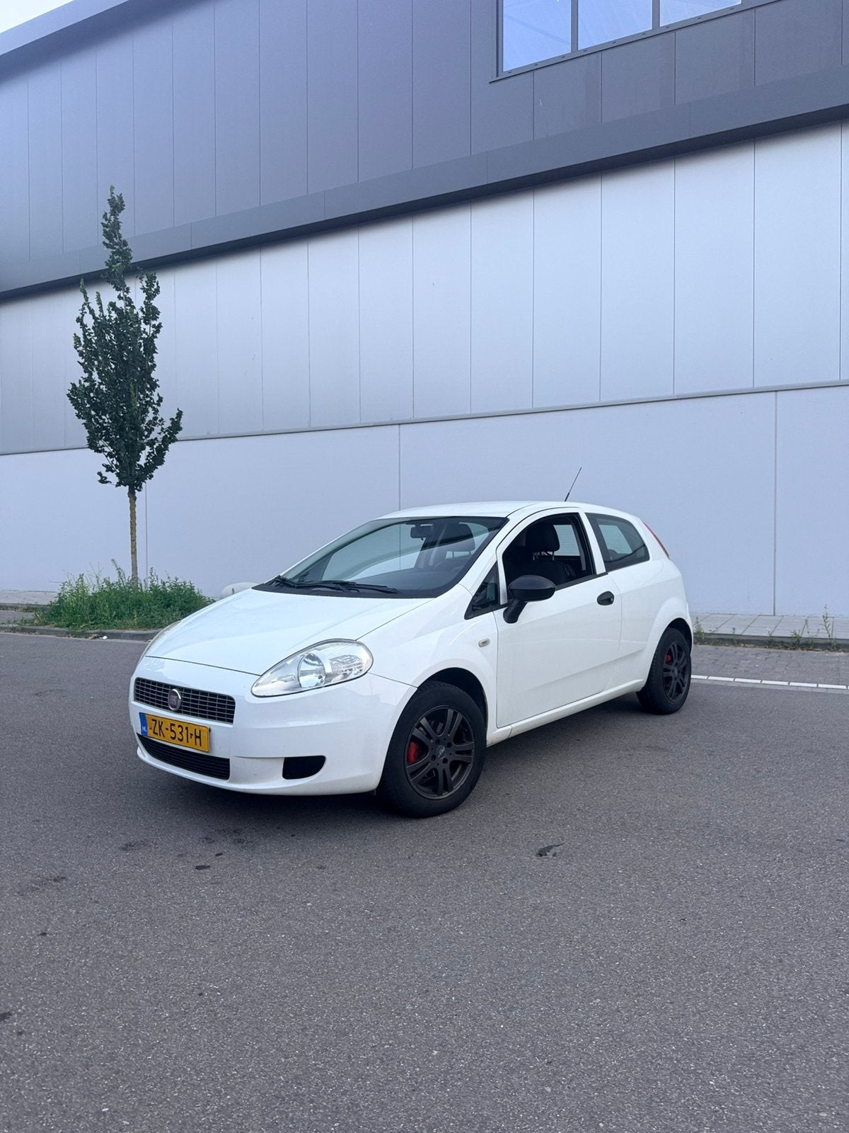 Fiat Punto 1.2 51KW/69PK 3DR Grande 2012 Wit, Auto's, Voorwielaandrijving, 40 €/maand, 1242 cc, 4 cilinders
